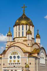 Fototapeta na wymiar Big church with golden roofs
