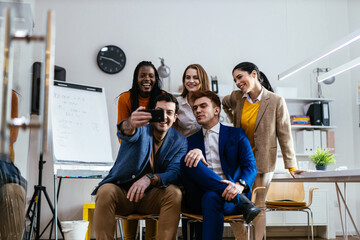 Cinematic image of   employers working in a start up business. Young people at work in a modern office