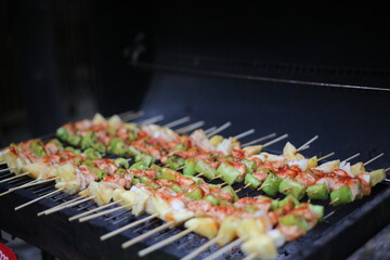 Barbecue is a term used with significant regional and national variations to describe various cooking methods which use live fire and smoke to cook the food