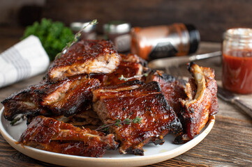 Barbecue ribs on wooden table