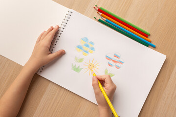 A child's drawing with a call to stop the war. Drawing in the colors of the flags of Russia and...