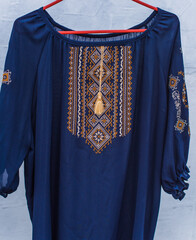 Ukrainian embroidered elements, concept of ethnic clothes, fashion details