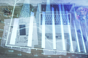Fototapeta na wymiar Multi exposure of financial chart drawing over table background with computer. Concept of research. Top view.