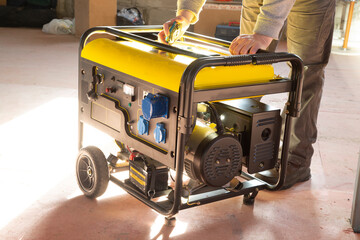 Portable gasoline generator.The use of an autonomous energy source. An additional source of energy. - obrazy, fototapety, plakaty