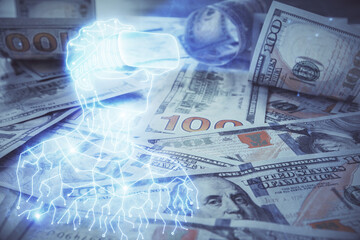 Fototapeta premium Double exposure of man wearing VR glasses drawing over usa dollars bill background. Concept of virtual reality.
