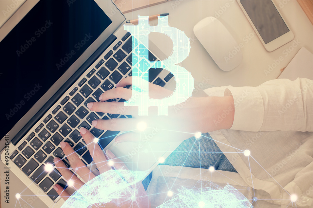 Poster double exposure of woman hands working on computer and blockchain theme hologram drawing. top view. 