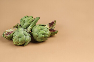 Obraz premium Concept of healthy food with artichoke, space for text