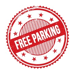 FREE PARKING text written on red grungy round stamp.