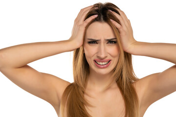 Naklejka premium unhappy nervous woman holding her head with her hands