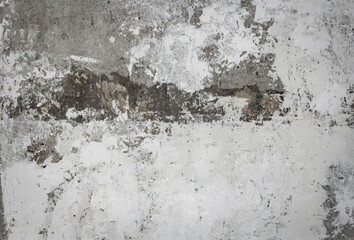 textured gray stucco background with scratches, scuffs and stains. abstract plaster backdrop for copy space