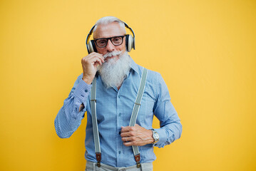 Cool Senior hipster man with stylish beard. Modern business man urban portraits outdoor. Conceptual...