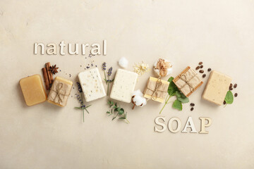 Handmade organic soap bars and ingredients on natural stone background, flat lay - obrazy, fototapety, plakaty