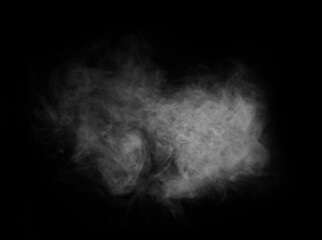 Abstract smoke texture over black. Fog in the darkness.