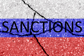 The flag of the Russian Federation on a cracked concrete wall with the words 