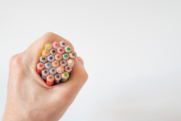 Crayons on a white background. education concept. Kindergarten concept during pandemic.
Idea of ​​pedology concept.