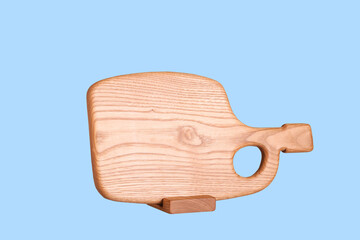 cutting board made of wood in the shape of a bottle on a white background, isolated object	