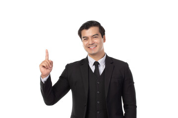 Portrait of a confident business man in black suit smile and pointing to copy space isolated on white background. Portrait business concept.