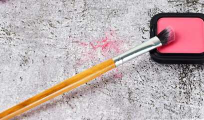 Close up, fine brush, for eye shadow make-up, on a stone base.