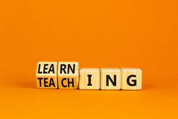 Learning or teaching symbol. Turned wooden cubes and changed the word Teaching to Learning....