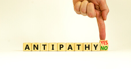 Antipathy yes or no symbol. Psychologist turns a wooden cube and change words Antipathy no to...