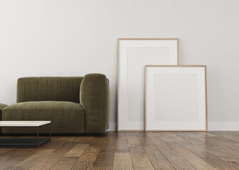 3d illustration White wall, two empty canvas, front view decorated with a green sofa and table. Parquet