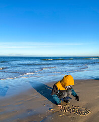 Little boy on the seashore