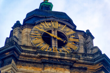 Old church clock tower in Brussels, Belgium.