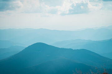 Fototapeta premium Peaks of blue mountains