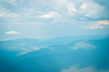 Obraz premium Peaks of blue mountains