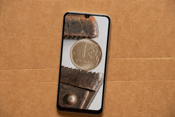 The gas key holds the Russian ruble as a background in the phone, the collapse of the ruble,...