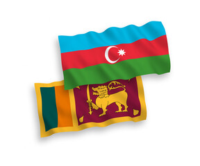 National vector fabric wave flags of Sri Lanka and Azerbaijan isolated on white background. 1 to 2 proportion.