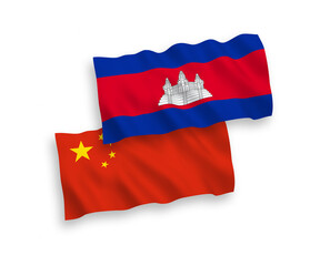 Fototapeta premium National vector fabric wave flags of Kingdom of Cambodia and China isolated on white background 1 to 2 proportion.