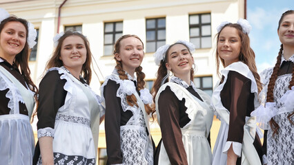 Happy Russian girls graduating on graduation day.