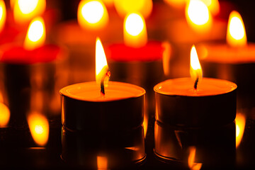 candle,burning candles on the dark surface of remembrance day,Burning candles in darkness 