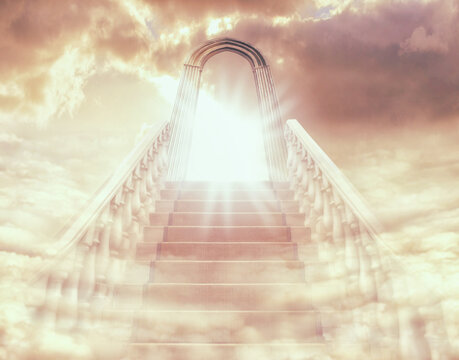 Theres a light at the end of the stairway. Shot of a stairway and door leading to Heaven.