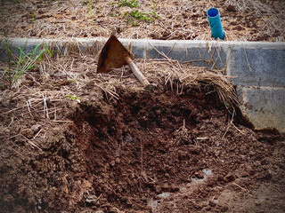 A pile of organic compost in garden outdoor.