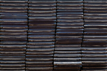 Piles of rubber liners for softening on metal. Rubber background.