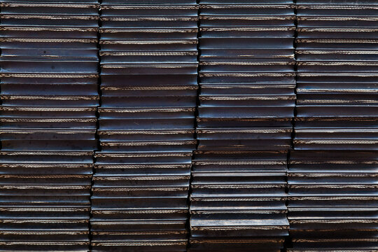 Piles of rubber liners for softening on metal. Rubber background.