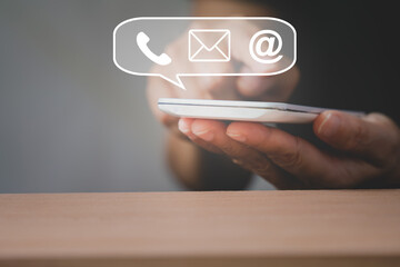 senior people hands using smartphone with icon, telephone ,email address and envelope, for contact us, connection and e-mail marketing , call center support concept
