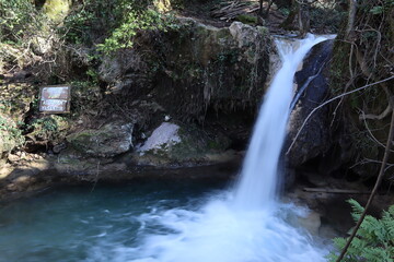 small waterfall called Turgut Falls, water falling into pond, hiking area in Marmaris,  Turkey