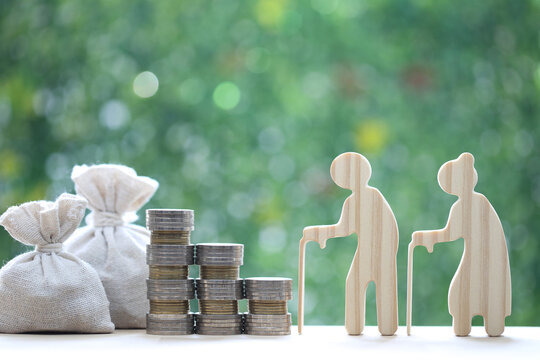 Mutual fund,Love couple senior and coins money in the bag on natural green background, Save money for prepare in future and pension retirement concept