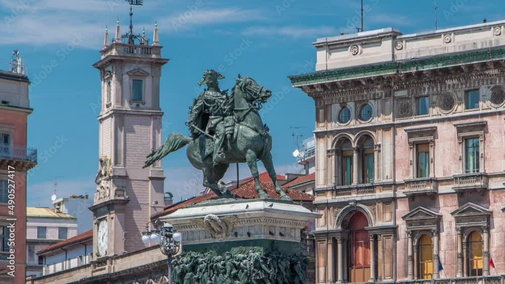 Wall mural vittorio emanuele ii statue at piazza del duomo timelapse. milan in lombardy, italy.