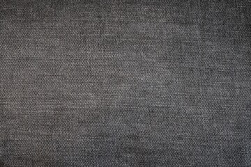 Fototapeta na wymiar black denim jeans fabric texture, black background