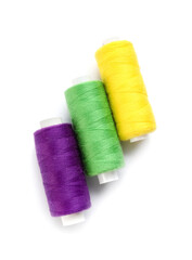 Beautiful sewing threads on white background