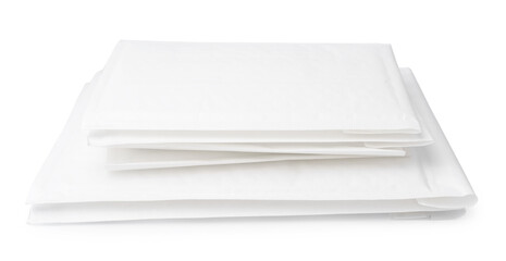 Stack of envelopes on white background