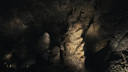 Giant Limestone Column Formations in Underground Cave Chamber in Carlsbad Caverns, New Mexico. 4K.