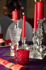 Pink and purple decoration and cupcakes on the table