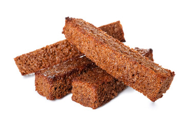Tasty rye croutons on white background