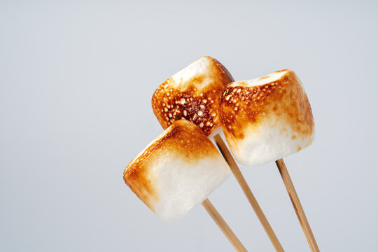 Roasted Marshmallow On A Stick, Isolated On A White Background.