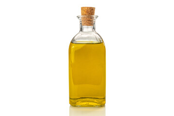 Extra virgin olive oil in glass bottle with cork isolated on white, clipping path